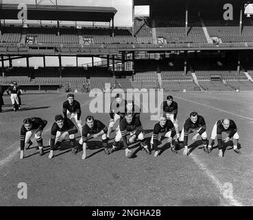 The Chicago Bears pose in their starting line up at Griffith