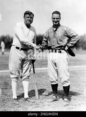 https://l450v.alamy.com/450v/2nghhdn/new-york-yankees-players-babe-ruth-left-and-lou-gehrig-shake-hands-at-the-yankee-training-camp-at-st-petersburg-fla-march-14-1933-gehrig-first-baseman-is-signed-up-with-the-clubhouse-but-ruth-has-yet-to-have-his-salary-approved-by-owner-col-jacob-ruppert-the-babe-says-he-will-quit-if-he-doesnt-get-60000-ap-photo-2nghhdn.jpg