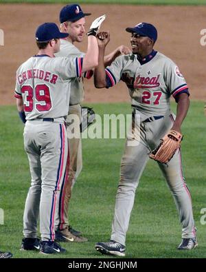 Montreal Expos Vladimir Guerrero (27) celebrates with teammate Brian  Schneider after hitting a three-run home run off San Diego Padres pitcher  Jaret Wright to beat the Padres 12-9 in 10 innings, in