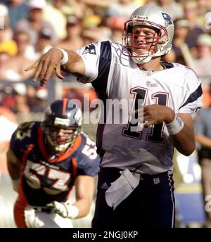 Atlanta Falcons quarterback Chris Chandler (12) is sacked by Denver Broncos  linebacker Bill Romanowski (53) during the first quarter of Super Bowl  XXXIII in Miami, Sunday, Jan 31, 1999. (AP Photo/Doug Mills