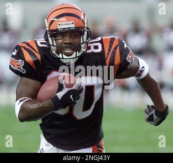 Peter Warrick of the Cincinnati Bengals runs with the ball during the