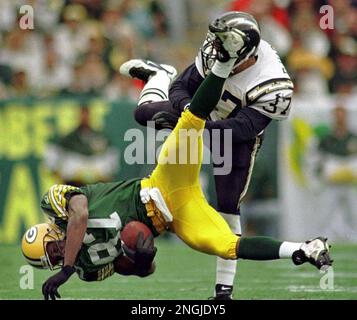 FILE - In this Aug. 15, 1996, file photo, Minnesota Vikings' John Randle  celebrates and points at his teammates on the sidelines after disrupting a  key fourth quarter pass by Chicago Bears'