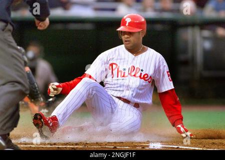 Philadelphia Phillies' Bobby Abreu slides home for an inside-the-park homer  against the New York Mets in the second inning Friday, May 14, 1999 in  Philadelphia. (AP Photo/ George Widman Stock Photo 
