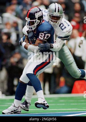 Deion Sanders competing for the Dallas Cowboys in a game against the New  York Giants in 1998 Stock Photo - Alamy