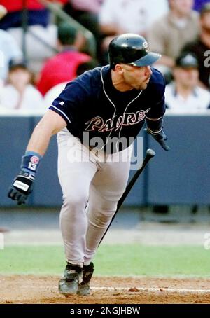 Atlanta Braves' Walt Weiss, left, is out at home as he collides with San  Diego Padres catcher Jim Leyritz during their National League playoff game,  Saturday, Oct. 10, 1998, in San Diego.