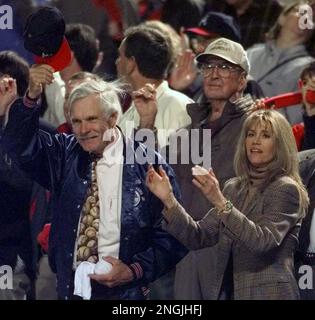 Former Atlanta Braves owner Ted Turner claps during introductions