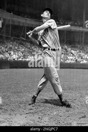 Ted Williams, slugging Boston Red Sox outfielder, is shown in a