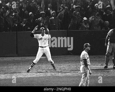 Carlton Fisk slams a 12th-inning home run to give Boston the sixth game of  the