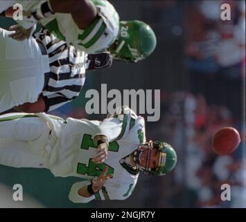 Cincinnati Bengals quarterback Ken Anderson, (14) releases the ball as New  York Jets' Kenny Neil (77)