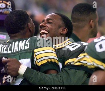 Green Bay Packers' Desmond Howard hugs teammate Tyrone Williams after his  team won Super Bowl XXXI in New Orleans Sunday Jan. 26, 1997. Howard won  the MVP award in the Packers 35-21 victory over the New England  Patriots.(AP Photo/Doug