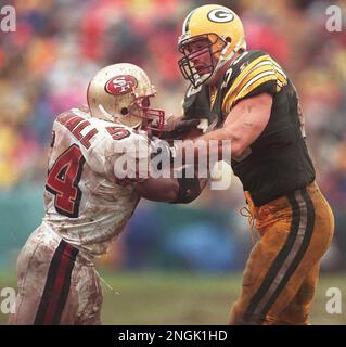 Green Bay Packers' Mark Chmura (89) glances back at Carolina