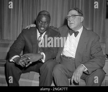 Jackie Robinson (left), being signed by Branch Rickey (right), to a one  year contract to play for the Brooklyn Dodgers, 1945 Stock Photo - Alamy