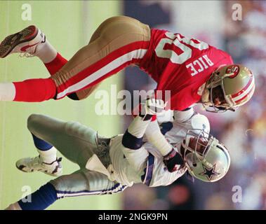 Dallas Cowboys defender Deion Sanders (21) knocks the ball away from San  Francisco 49ers receiver Jerry Rice (80) in the second quarter in Irving,  Texas, Sunday, Nov. 12, 1995. (AP Photo/Eric Gay