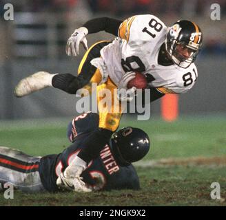 Minnesota Vikings running back Robert Smith (26) runs for a gain before  Chicago Bears line backer Barry Minter (92) tackles him in the third  quarter in Minneapolis, Sunday, Sept. 3, 2000. The