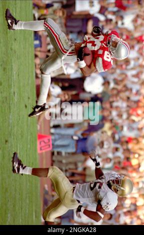 Ohio State quarterback Bobby Hoying runs for a first down in the third  quarter against Notre Dame Saturday, Sept. 30, 1995, in Columbus, Ohio.  Ohio State's 1995 team bears an uncanny resemblance