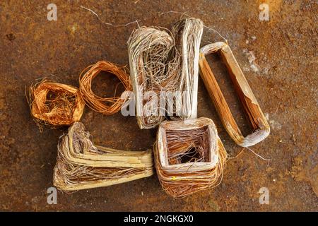 Red metal copper wire scrap materials recycling of waste from manual wire tearing. Closeup of copper waste in the form of copper wires Stock Photo