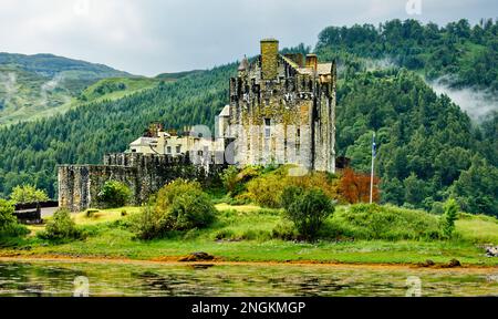 Eilean Donan Castle Loch Duich Scotland the castle in summer after a heavy rain shower Stock Photo