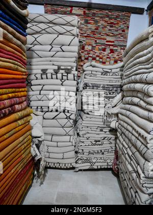 Pile of Beni Ourain rugs in Marrakech, Morocco. Stock Photo