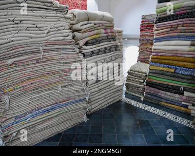 Pile of Beni Ourain rugs in Marrakech, Morocco. Stock Photo