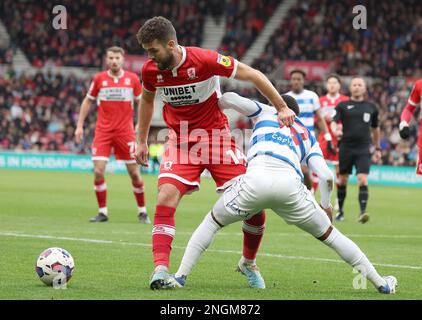Tommy Smith (L) of Middlesbrough in action with Kenneth Paal of Queens Park Rangers during the Sky Bet Championship match Middlesbrough vs Queens Park Rangers at The Riverside Stadium, Middlesbrough, United Kingdom, 18th February 2023  (Photo by Nigel Roddis/News Images) Stock Photo