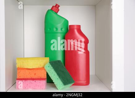 Cleaning supplies and tools on shelves and cabinets in pantry room Stock  Photo - Alamy