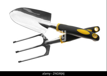 Trowel and pitchfork on white background, top view. Gardening tools Stock Photo