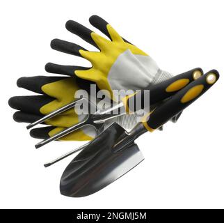 Trowel, gloves and pitchfork on white background, top view. Gardening tools Stock Photo