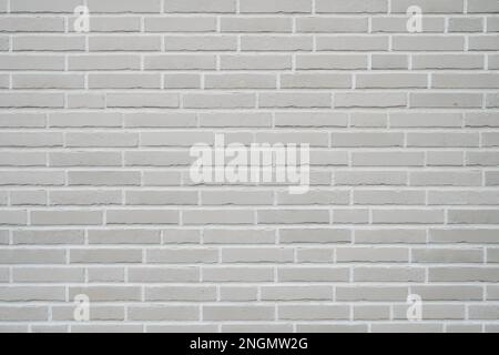 gray clinker brick wall background - modern building exterior with brick slip cladding Stock Photo