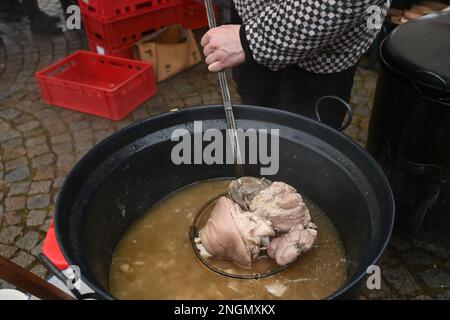 Velka Bystrice, Czech Republic. 18th Feb, 2023. Traditional Slavic carnival was held on February 18, 2023, in Velka Bystrice, Czech Republic. On the photo is seen a pig slaughtering, part of the carnival. Credit: Ludek Perina/CTK Photo/Alamy Live News Stock Photo