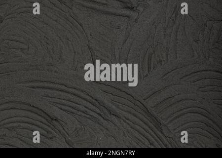 Texture of dark gray concrete wall, Texture of a grungy black concrete wall as background Stock Photo