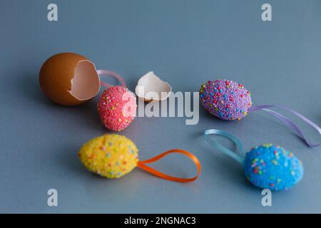 Easter eggs painted in pastel colors on a white cracked Stock Photo