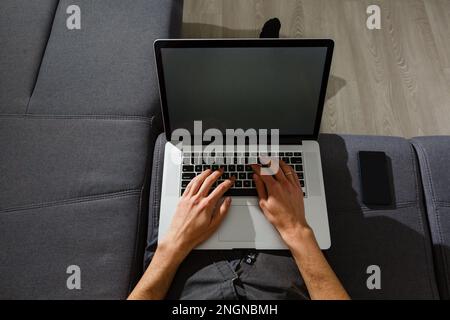 elegant business multitasking multimedia man using devices at home Stock Photo
