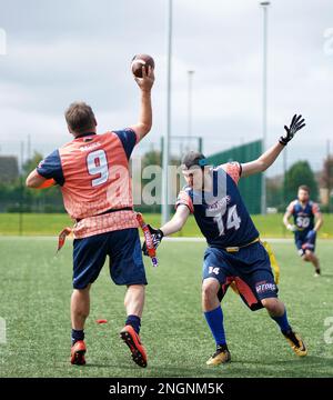 Rusher pressuring the Quaterback during a Flag Football game in Wales ...