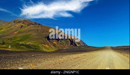 Typical icelandic dirt road in arid wild rugged rough landscape - Iceland, Highlands Stock Photo