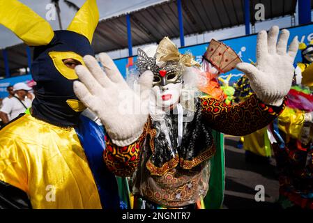 Salvador, Bahia, Brazil - February 11, 2023: A group wearing traditional Venetian carnival costumes are seen during the pre-Carnival Fuzue parade in t Stock Photo