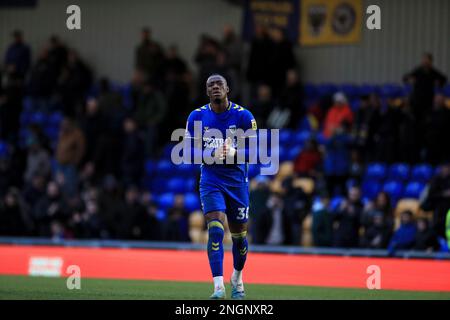 London, UK. 18th Feb, 2023. Paul Kalambayi of AFC Wimbledon applauds fans at full time during the EFL Sky Bet League 2 match between AFC Wimbledon and Hartlepool United at Plough Lane, London, England on 18 February 2023. Photo by Carlton Myrie. Editorial use only, license required for commercial use. No use in betting, games or a single club/league/player publications. Credit: UK Sports Pics Ltd/Alamy Live News Stock Photo