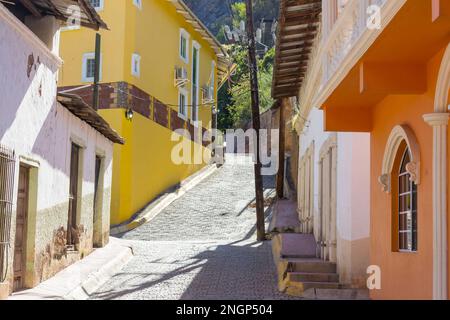 Amazing colorful buildings in pueblo magico Batopilas in Barrancas del Cobre mountains, Mexico Stock Photo