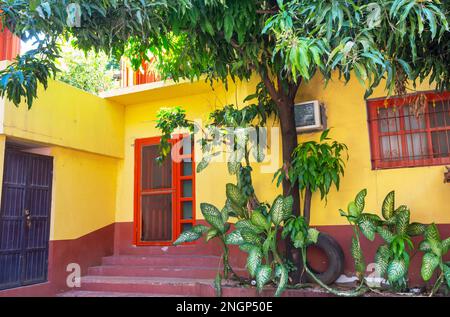 Amazing colorful buildings in pueblo magico Batopilas in Barrancas del Cobre mountains, Mexico Stock Photo