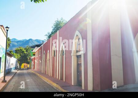 Amazing colorful buildings in pueblo magico Batopilas in Barrancas del Cobre mountains, Mexico Stock Photo