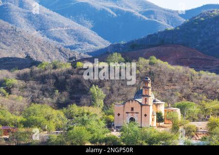 Amazing colorful buildings in pueblo magico Batopilas in Barrancas del Cobre mountains, Mexico Stock Photo