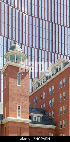 MIT Museum is backdrop for Kendall Hotel, built around a former firehouse on Cambridge’s Main Street. The cupola-topped tower once dried fire hoses. Stock Photo