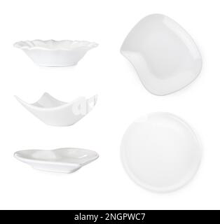 Set with empty heart shaped plates on white background Stock Photo - Alamy