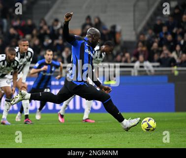 Milan, Italy. 18th Feb, 2023. FC Inter's Romelu Lukaku scores during a Serie A football match between FC Inter and Udinese in Milan, Italy, on Feb. 18, 2023. Credit: Str/Xinhua/Alamy Live News Stock Photo