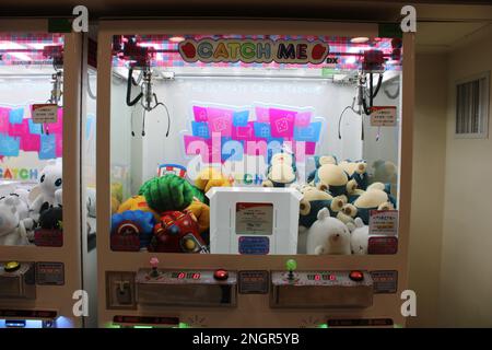 Arcade claw game machines with Pokemon characters Stock Photo