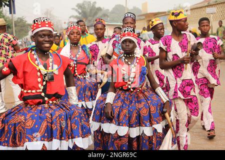 Ouidah, Benin. 17th Feb, 2023. People take part in a parade during the Benin International Arts Festival in Ouidah, Benin, Feb. 17, 2023. The festival, scheduled between Feb. 14 to 19 and held simultaneously in Porto-Novo, Cotonou and Ouidah, features music, dance, film, drama, literature and some other art forms. Credit: Seraphin Zounyekpe/Xinhua/Alamy Live News Stock Photo