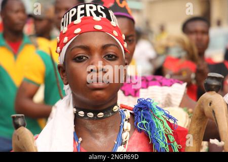 Ouidah, Benin. 17th Feb, 2023. People take part in a parade during the Benin International Arts Festival in Ouidah, Benin, Feb. 17, 2023. The festival, scheduled between Feb. 14 to 19 and held simultaneously in Porto-Novo, Cotonou and Ouidah, features music, dance, film, drama, literature and some other art forms. Credit: Seraphin Zounyekpe/Xinhua/Alamy Live News Stock Photo