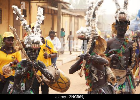 Ouidah, Benin. 17th Feb, 2023. People take part in a parade during the Benin International Arts Festival in Ouidah, Benin, Feb. 17, 2023. The festival, scheduled between Feb. 14 to 19 and held simultaneously in Porto-Novo, Cotonou and Ouidah, features music, dance, film, drama, literature and some other art forms. Credit: Seraphin Zounyekpe/Xinhua/Alamy Live News Stock Photo