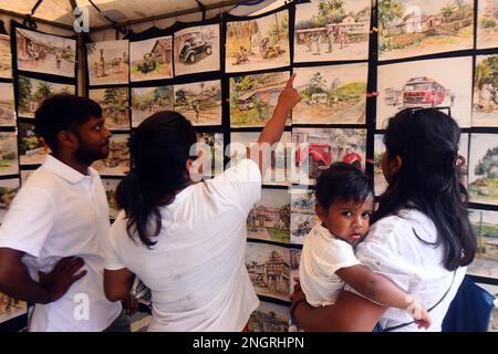 Colombo, Sri Lanka. 19th Feb, 2023. People visit the Kala Pola, an annual open-air art exhibition, in Colombo, Sri Lanka, Feb. 19, 2023. Credit: Gayan Sameera/Xinhua/Alamy Live News Stock Photo