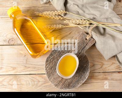 sunflower oil on a wooden background. High quality photo Stock Photo
