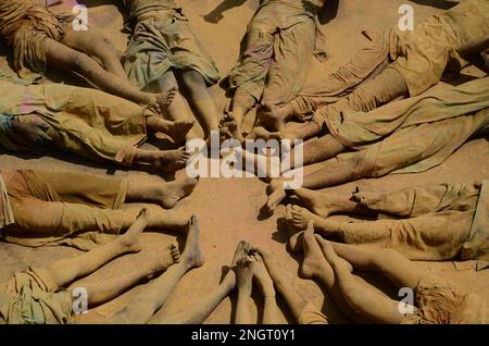 India, Madhya Pradesh, Jabalpur : Ved Pathi students smearing 'gulal' powder on each other's faces as they celebrate Holi festival at Narmada Ved Vigyan sanskrit Vidyalaya in Jabalpur. Photo by - Uma Shankar Mishra Stock Photo